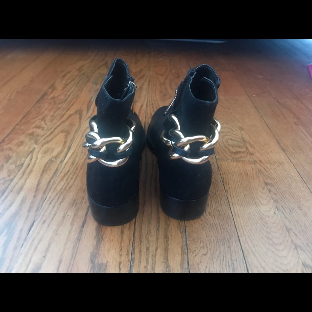 Sam Edelman Chester boots with gold chain.